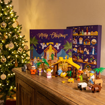 Il presepe di mattoncini completo accanto all'albero di Natale